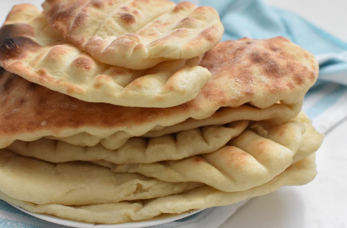 Stack of pita bread on a plate